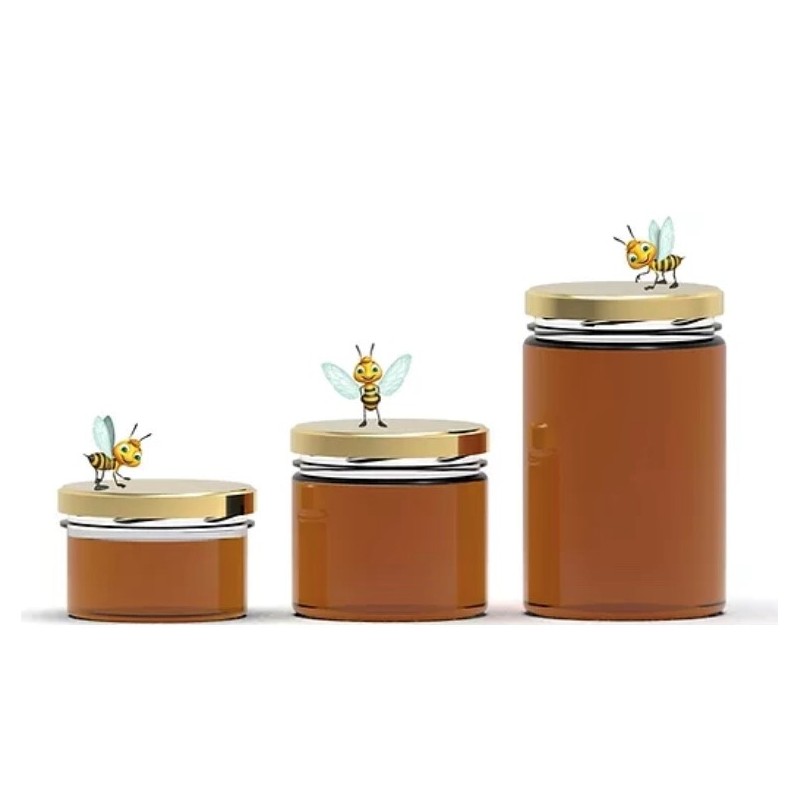 Miel naturel avec un pot en verre en vente